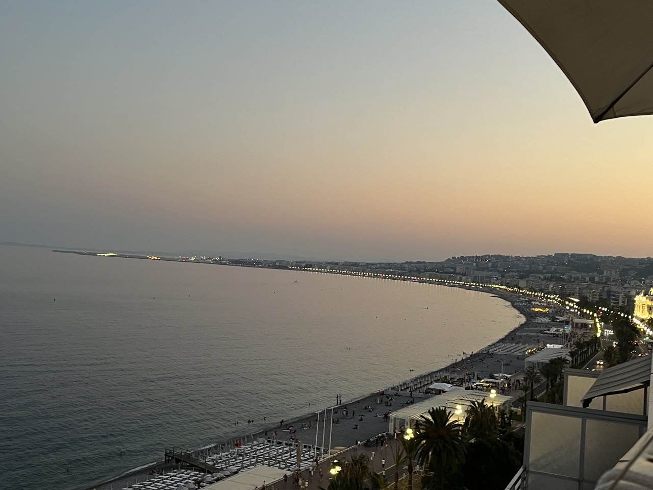 The Promenade des Anglais in Nice, France, with the turquoise Baie des Anges